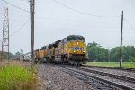 A westbound manifest rolls through Wagoner 